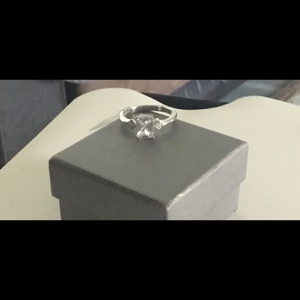 1.8 Ct. Emerald Cut Simulated Diamond Bridal Ring